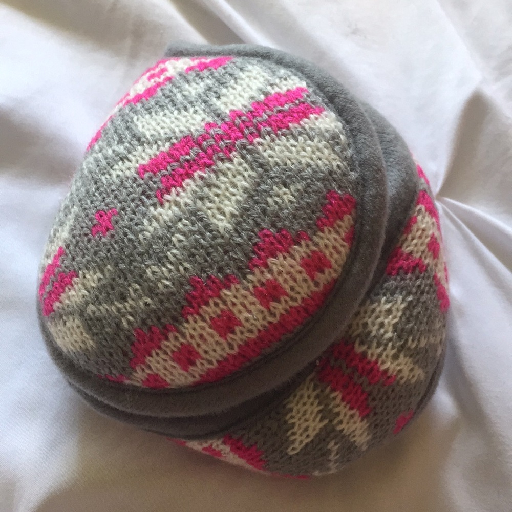 Pink grey and white earmuff.